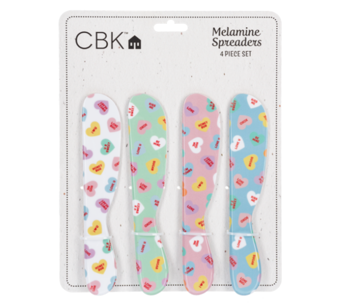 Set of four melamine spreaders with colorful patterns on a CBK branded card.