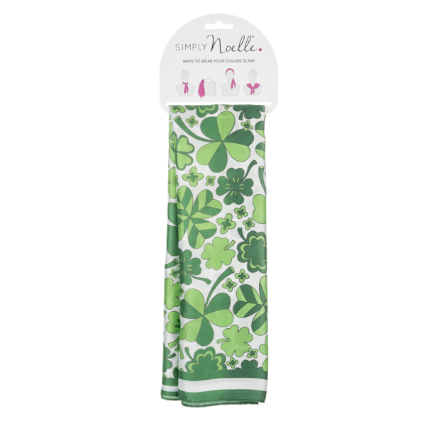 Green shamrock patterned square scarf with 'Simply Noelle' branding on a white background