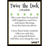 Card with 'Twice the Luck Charm' text and clover symbols, featuring GANZ branding.