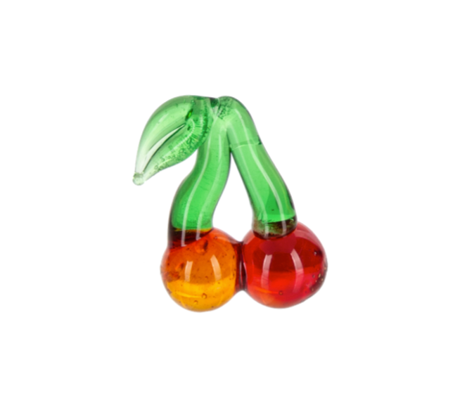 Transparent cherry-shaped charm on a white background