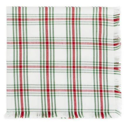 Christmas plaid napkin in red white and green.