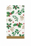 A white napkin printed with a festive holly and berry pattern, featuring green leaves, red berries, and gold decorative borders at the bottom.