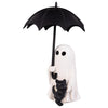 Ghost figurine holding a black umbrella with a small black cat on a white background
