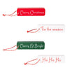 Four Christmas-themed wooden blocks with festive sayings on a white background