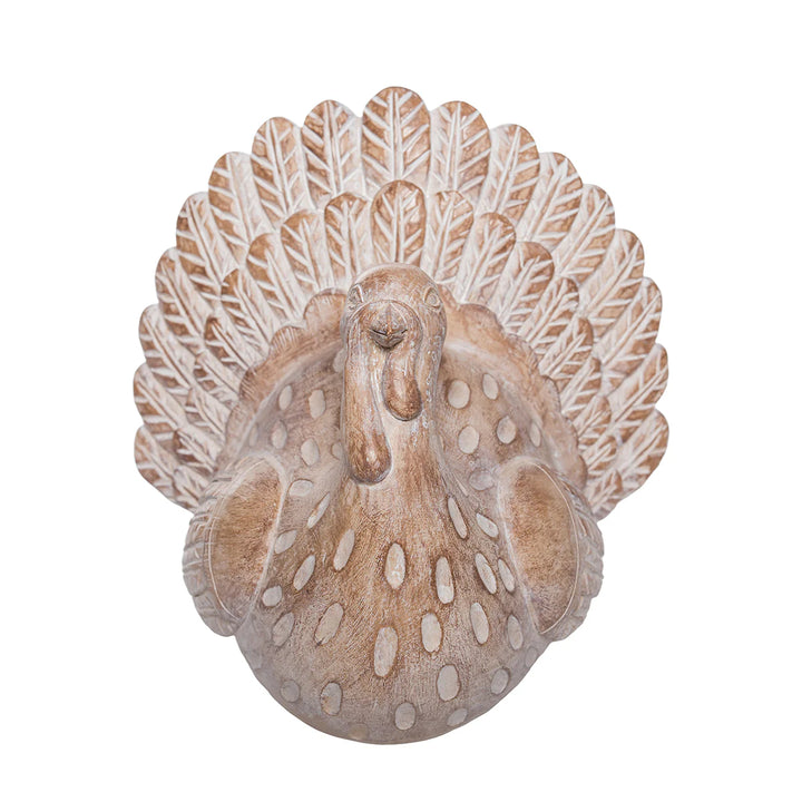Decorative resin turkey on a white background