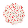 Scalloped-edge plate with strawberry pattern on a white background