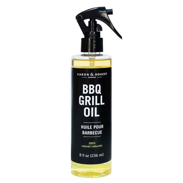 Bottle of Caron & Doucet BBQ Grill Oil on a white background