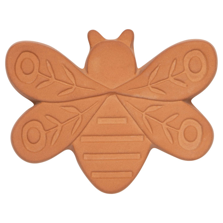 Butterfly-shaped brown sugar saver with embossed design on a white background