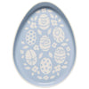 Decorative plate with white egg and floral patterns on a light blue background