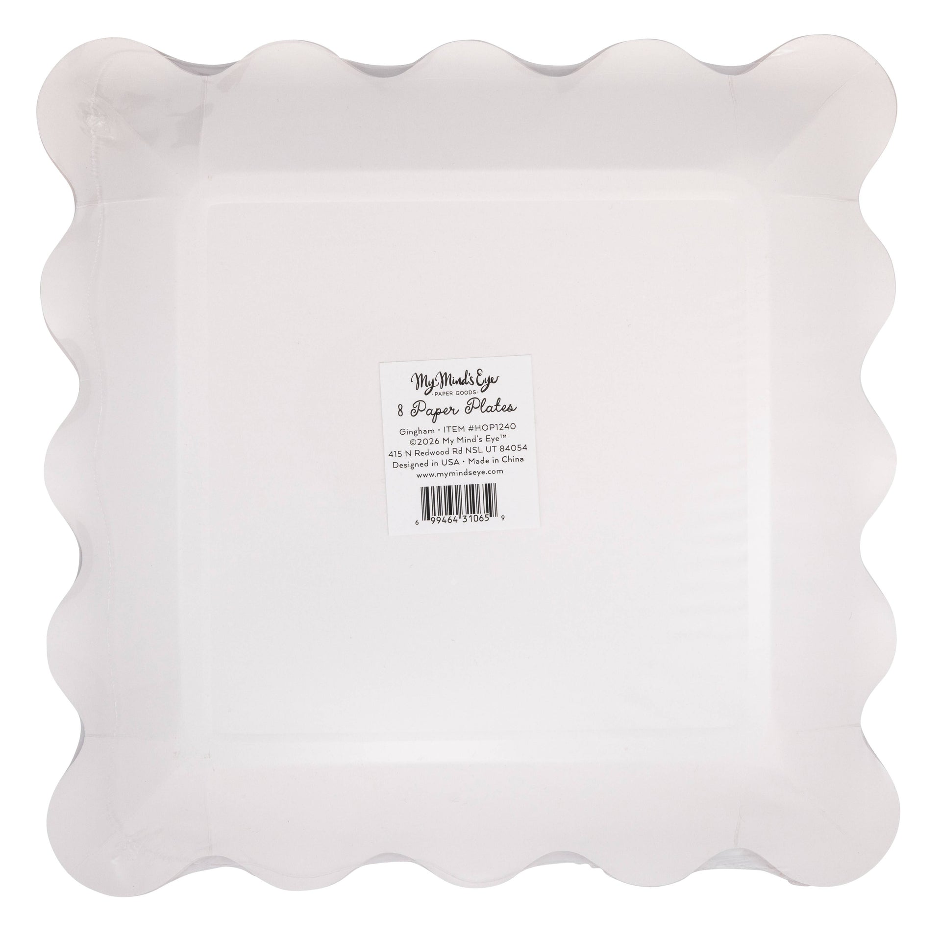 Bottom view of scalloped-edged paper plate with brand label on a white background
