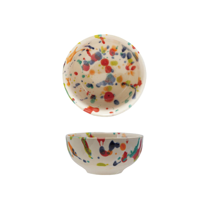 A white bowl with colorful speckles shown from front and  top view on a white background. 