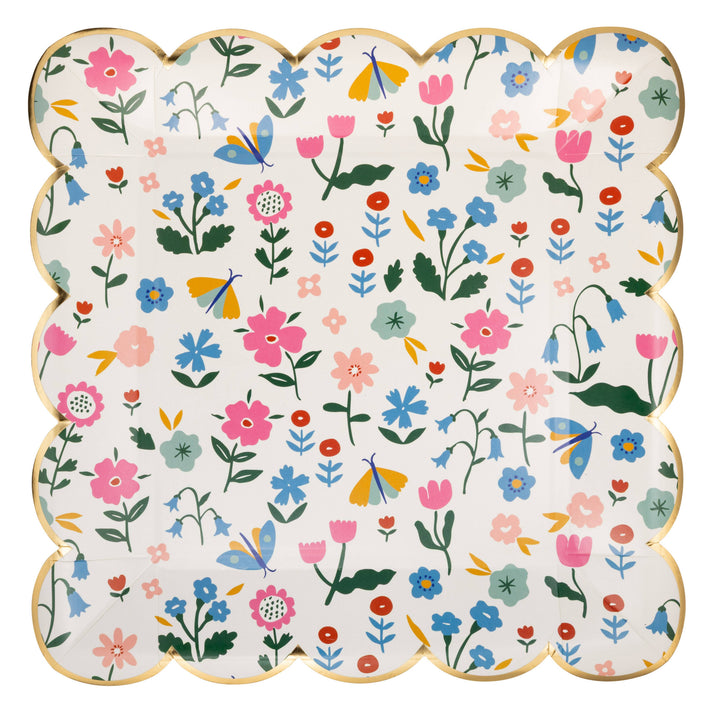 Decorative paper plate with a colorful floral pattern on a white background