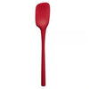 Red spoonula kitchen tool on a white background