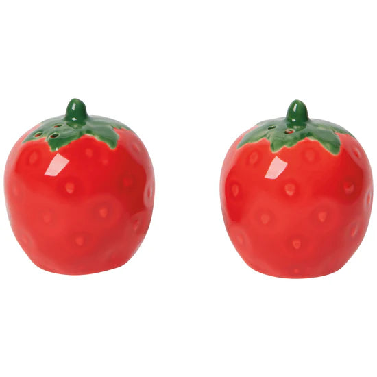 Two strawberry-shaped salt and pepper shakers on a white background