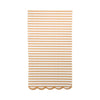 Striped tan and white napkin with scalloped edge on a white background