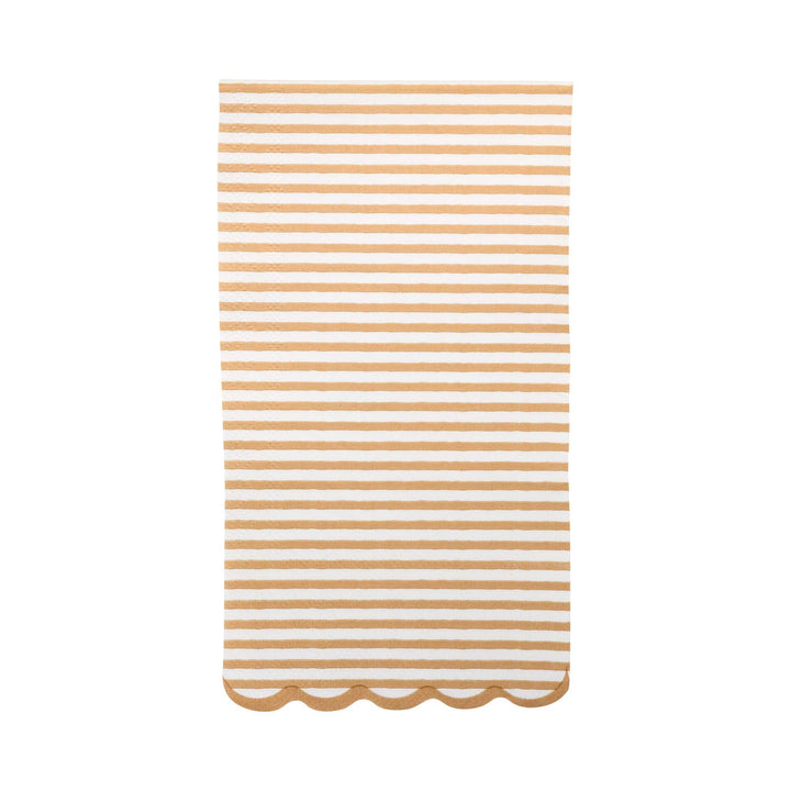 Striped tan and white napkin with scalloped edge on a white background
