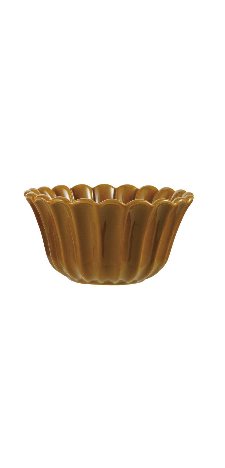 One brown ceramic stoneware bowl on a white background