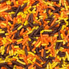 Colorful sprinkles in orange, yellow, and brown.