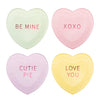 Four heart-shaped paper plates with Valentine's Day phrases on a white background
