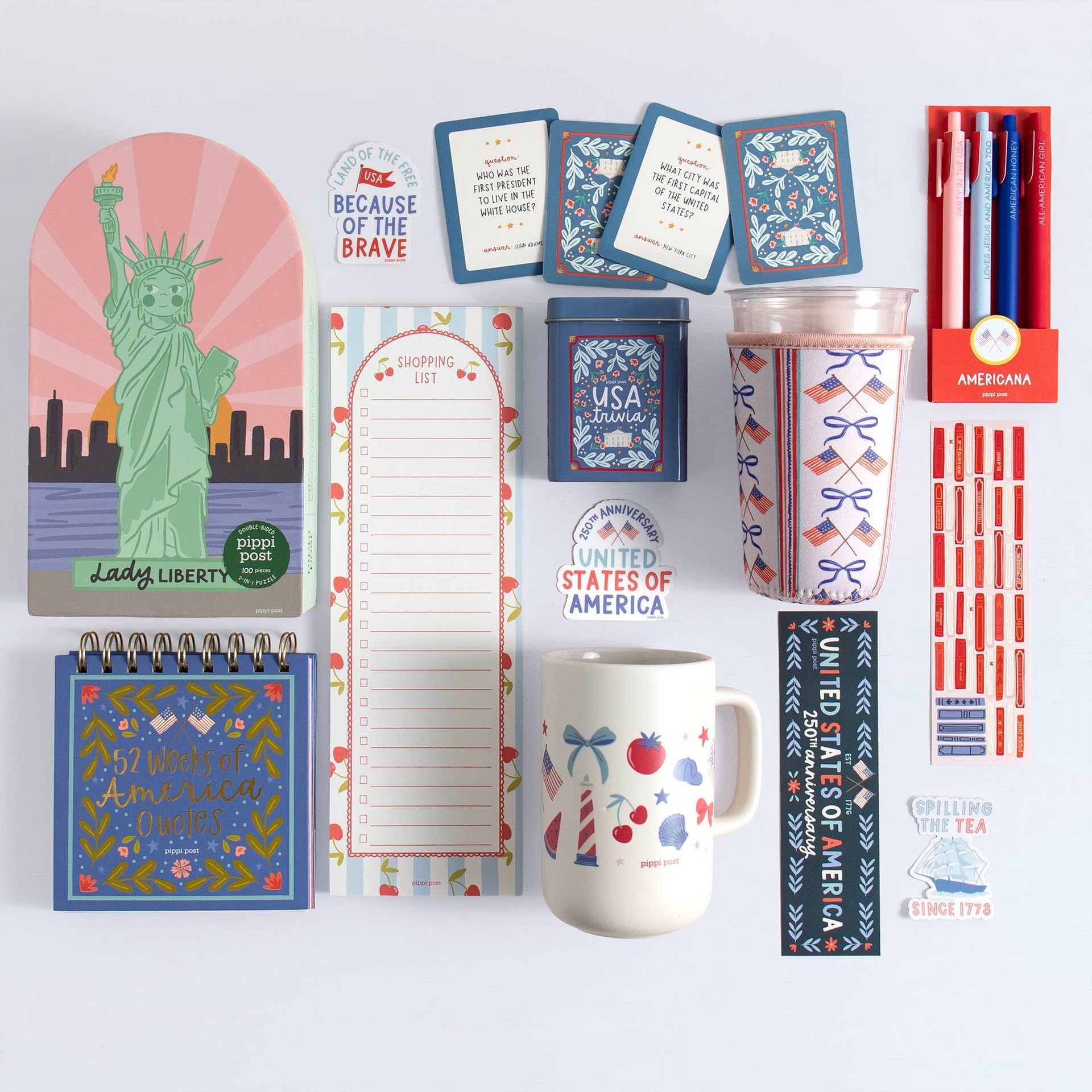 Collection of patriotic stationery items including a mug, notepads, and planners on a white background.