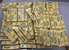 Multiple packages of butter squishy toys stacked on a flat surface