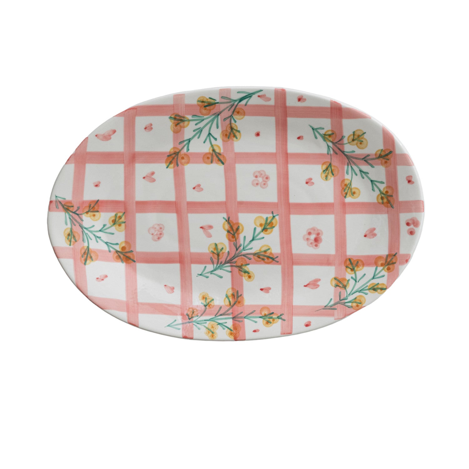 Oval platter with pink checkered pattern and floral designs on a white background