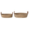 Two woven baskets with leather handles on a white background