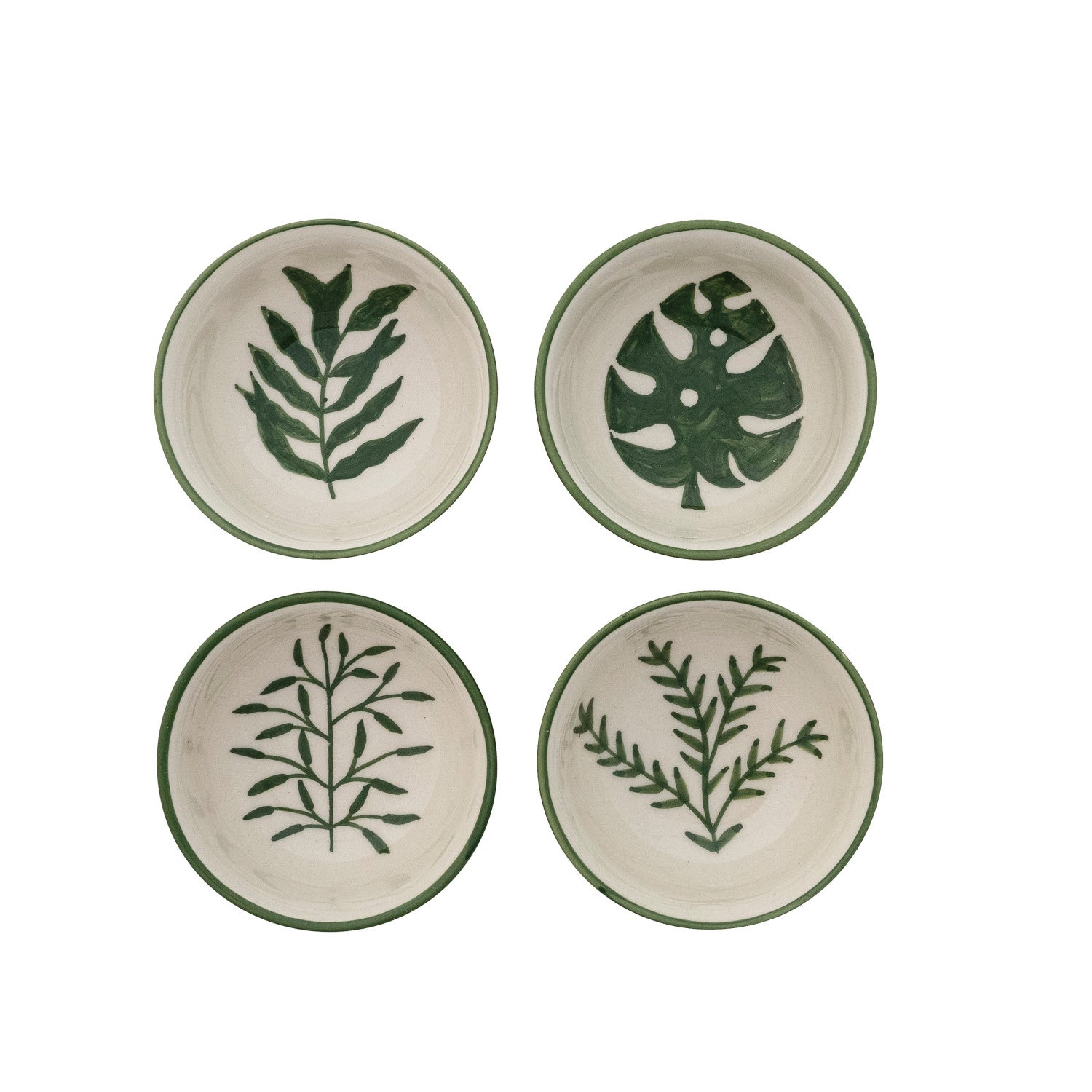 Four bowls with green leaf patterns on a white background