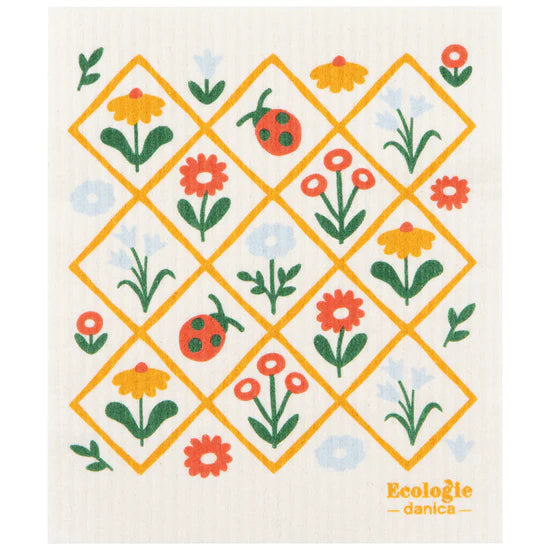 Patterned dishcloth with floral and insect design on a white background, featuring the brand 'Ecologie danica'.