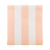 Paper table runner with pink and white stripes on a white background