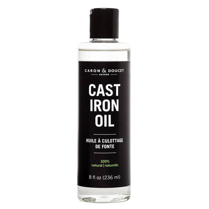 Bottle of Caron & Doucet Cast Iron Oil on a white background