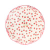 Package of paper plates with strawberry pattern on a white background