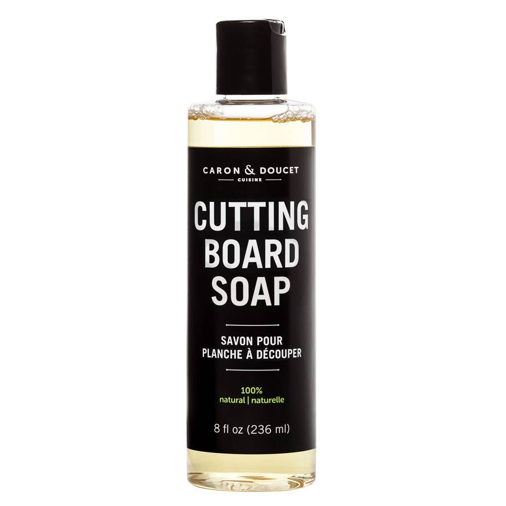 Bottle of Caron & Doucet Cutting Board Soap on a white background