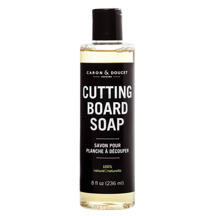 Bottle of Caron & Doucet Cutting Board Soap on a white background