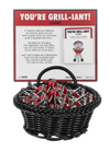 Basket of red and silver grill charms with a humorous label on a white background