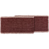 Woven table runner with a textured pattern on a white background