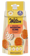 Wilton orange decorating icing package on a white background