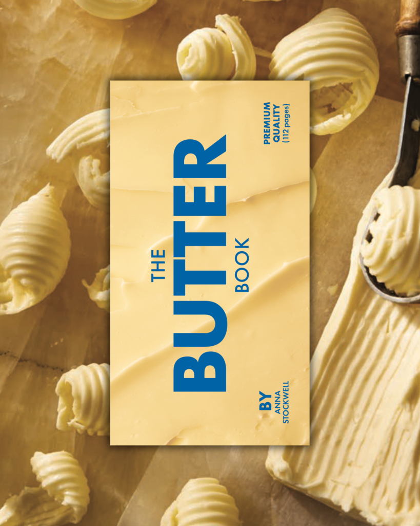 Book titled 'The Butter Book' with butter spread on a textured surface