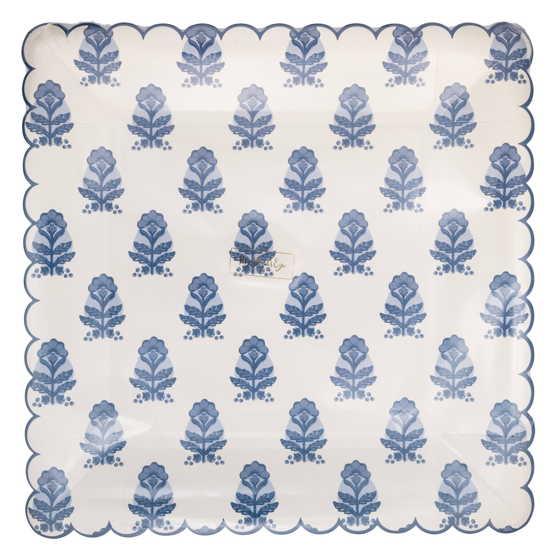 Scalloped edge paper plate with blue floral pattern