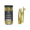 Jar of pickled asparagus with a label on a white background