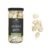 Jar of pickled garlic with a label on a white background