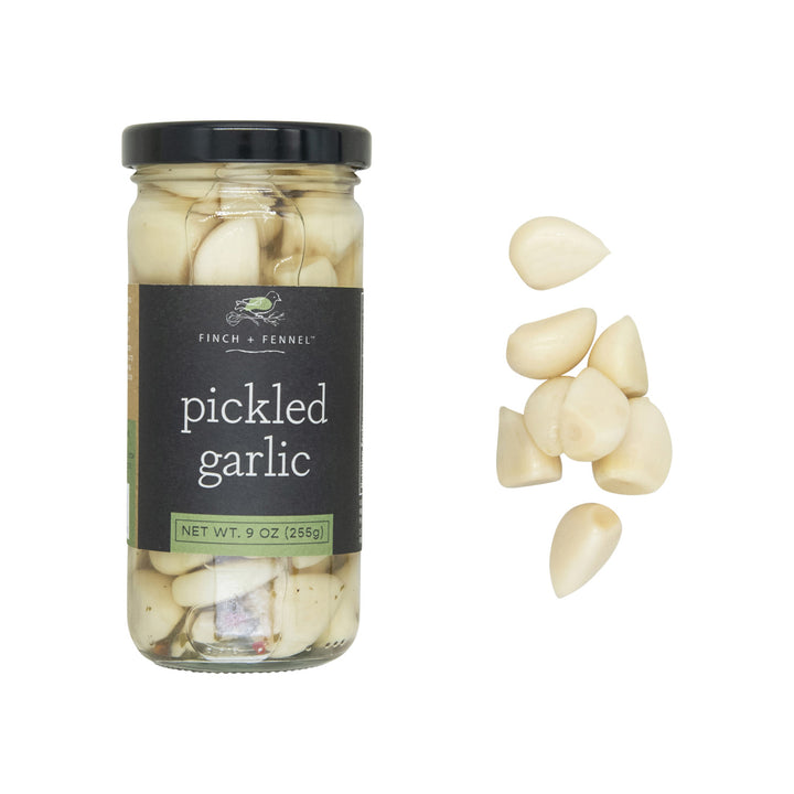 Jar of pickled garlic with a label on a white background