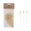 Packaged picks with a gold ball top on a white background 