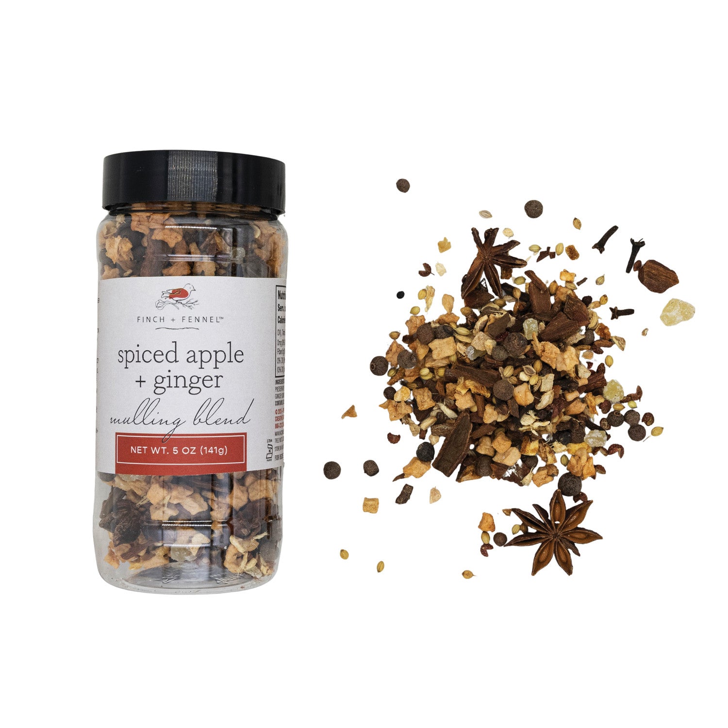 Spiced apple and ginger mulling blend with jar and scattered spices on a white background