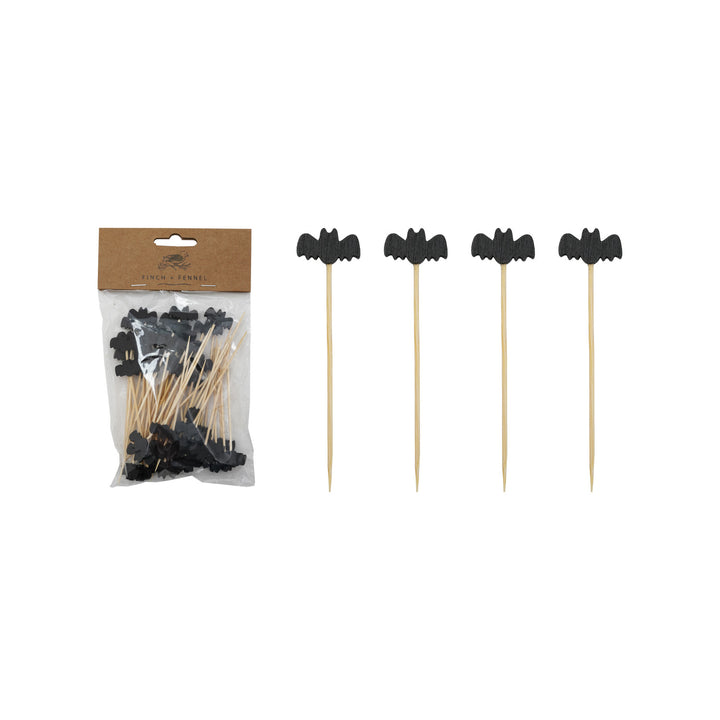 Packaged black bat-shaped toothpicks with a clear plastic bag on a white background