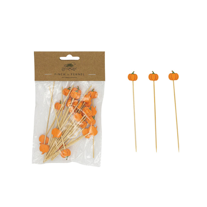 Packaged pumpkin-shaped toothpicks with a visible brand label on a white background