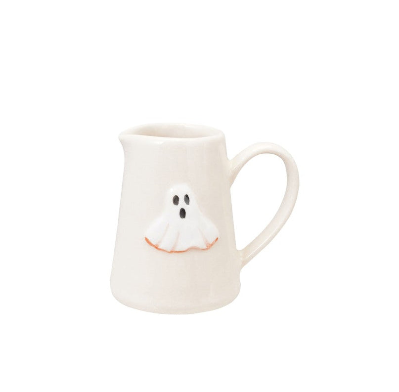 White halloween mug with ghost design on a white background