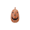 Decorative tall pumpkin with a carved face on a white background