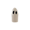 White ghost-shaped decor with black eyes on a white background