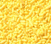Close-up of yellow candy sprinkles